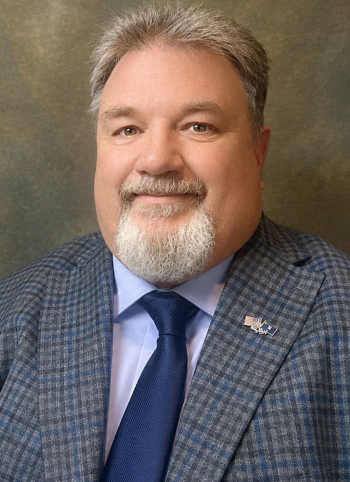 TIM RHODES